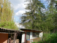 Prodej stavebního pozemku s hrubou stavbou v Nákle