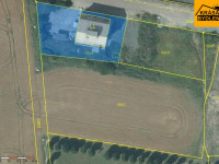 Prodej stavebních pozemků s komerčním objektem v Uničově